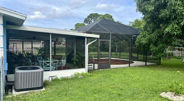 Photo of 977 SW Sarto Ln, Port St. Lucie, FL 34953