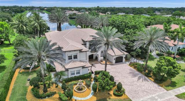 Property at 11356 Canyon Maple Blvd, Davie, FL 33330, 6 beds, 5.5 baths