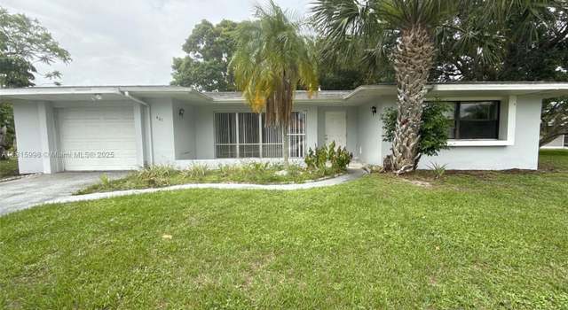 Photo of 401 NE Cornwall Ave, Port St Lucie, FL 34983