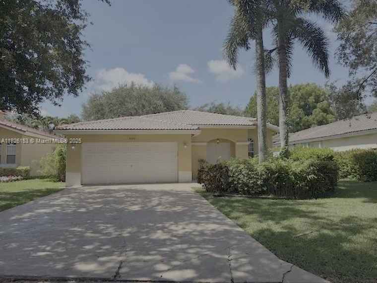 Photo of 4390 NW 41st Pl Coconut Creek, FL 33073