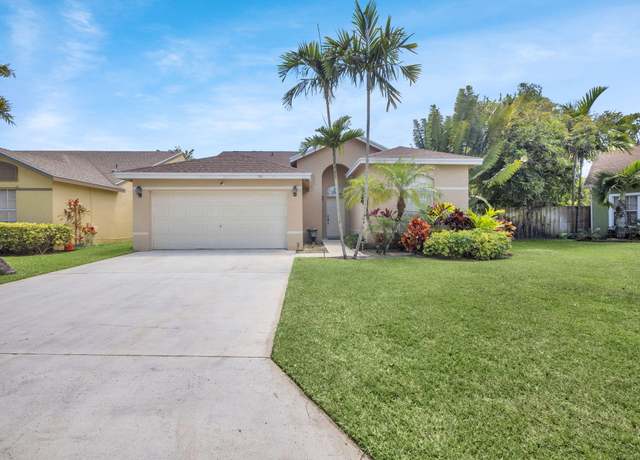 Property at 150 Heatherwood Dr, Royal Palm Beach, FL 33411, 3 beds, 2 baths