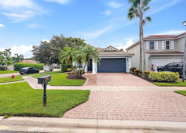 Property at 715 Belle Grove Ln, Royal Palm Beach, FL 33411, 4 beds, 2 baths