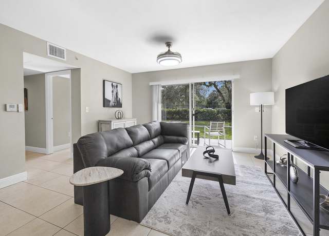 Property at 1400 Crestwood Ct S #1401, Royal Palm Beach, FL 33411, 4 beds, 2 baths