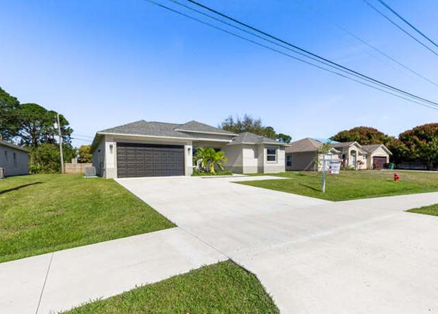Property at 1317 SW Paar Dr, Port Saint Lucie, FL 34953, 4 beds, 3 baths