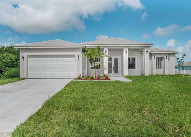 Property at 5817 NW Zenith Dr, Port Saint Lucie, FL 34986, 4 beds, 3 baths