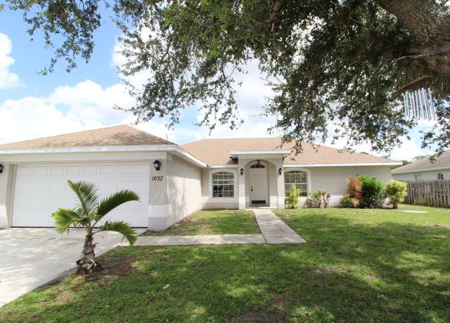 Property at 1037 SW Paar Dr, Port Saint Lucie, FL 34953, 3 beds, 2 baths