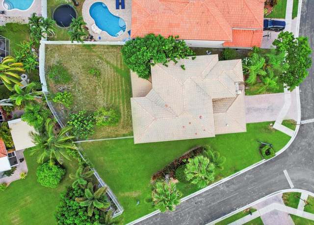 Property at 6678 Traveler Rd, West Palm Beach, FL 33411, 4 beds, 3 baths