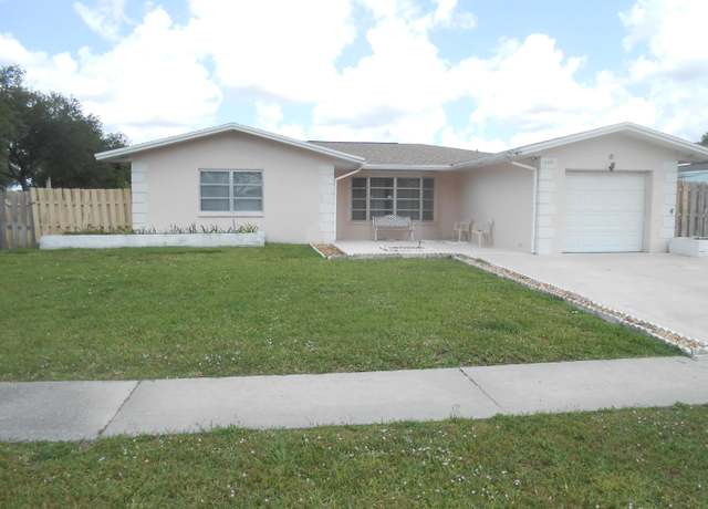 Property at 878 Gardenia Dr, Royal Palm Beach, FL 33411, 3 beds, 2 baths