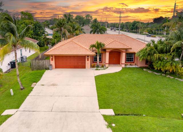 Property at 1698 SW Mercedes Ave, Port Saint Lucie, FL 34953, 4 beds, 3 baths