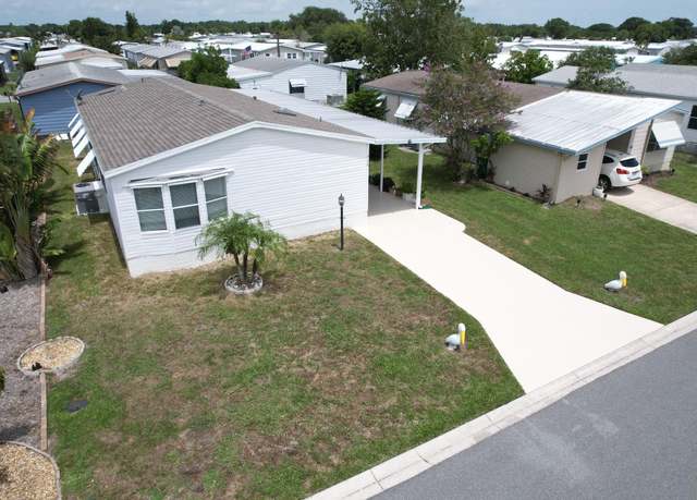 Property at 908 Bougainvillea Cir, Barefoot Bay, FL 32976, 2 beds, 2 baths