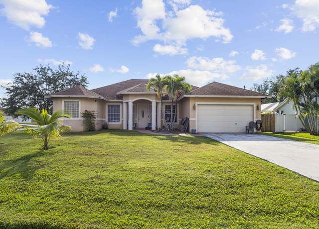 Property at 2001 SE Parrot St, Port Saint Lucie, FL 34952, 4 beds, 2 baths