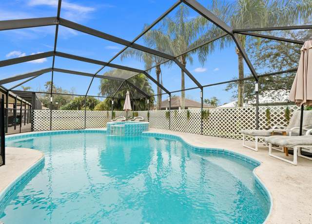 Property at 2457 SW Mercer St, Port Saint Lucie, FL 34984, 4 beds, 4 baths