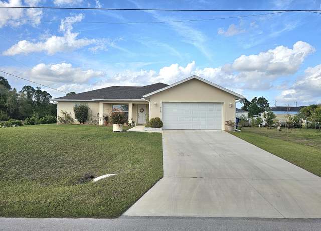Property at 2518 21st St SW, Lehigh Acres, FL 33976, 4 beds, 3 baths