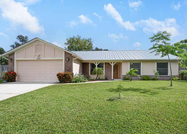 Property at 2485 SE Tracy Ave, Port Saint Lucie, FL 34952, 4 beds, 2 baths