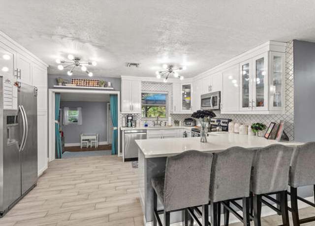 Property at 5865 SE Rosemont Ave E, Stuart, FL 34997, 3 beds, 2 baths