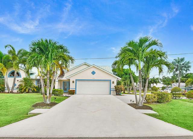 Property at 702 SE Adams Ct, Port Saint Lucie, FL 34984, 4 beds, 2 baths