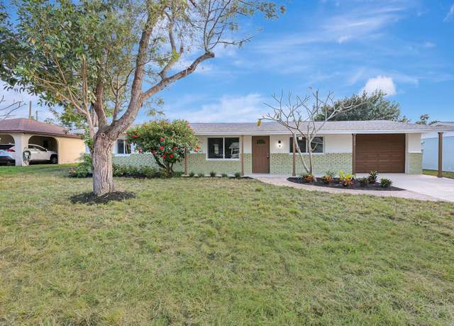 Property at 1464 NE Croton St, Jensen Beach, FL 34957, 4 beds, 2 baths