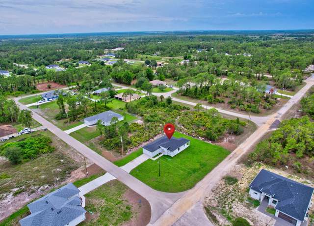 Property at 842 Downer Ave S, Lehigh Acres, FL 33974, 3 beds, 2 baths