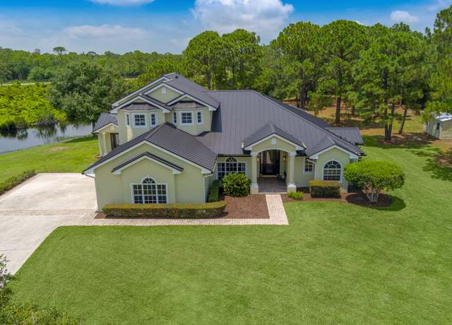 Property at 2501 SW Buena Vista Dr, Palm City, FL 34990, 4 beds, 3.5 baths