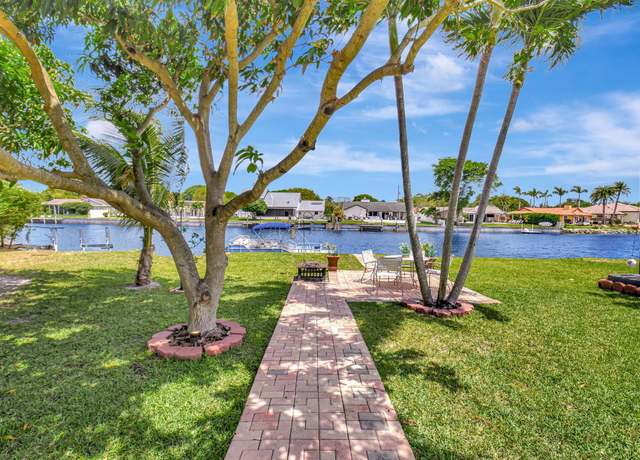 Property at 147 Oregon Ln, Boca Raton, FL 33487, 4 beds, 4 baths