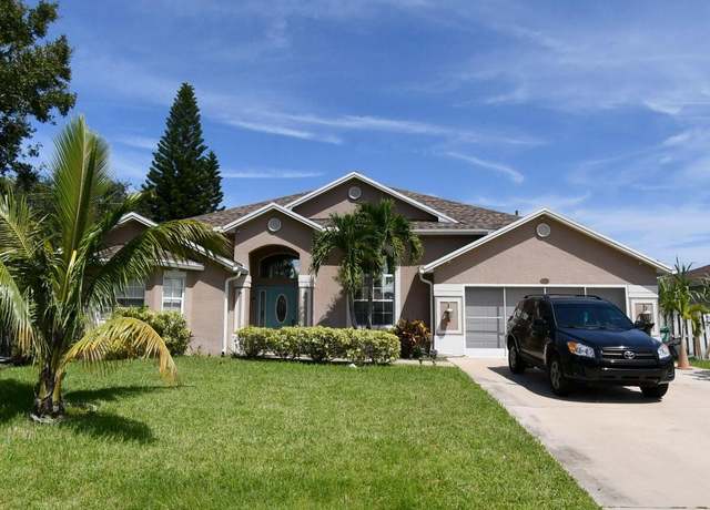 Property at 1937 SW Davis St, Port Saint Lucie, FL 34953, 4 beds, 3.5 baths