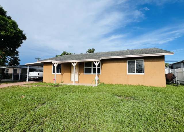 Property at 857 Scott Dr, West Palm Beach, FL 33415, 3 beds, 2 baths