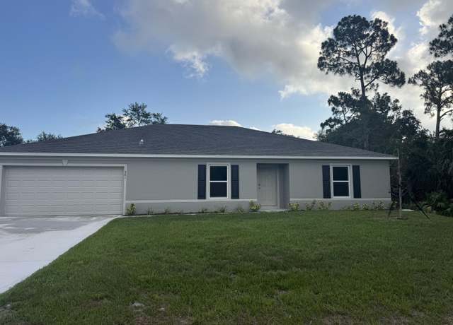 Property at 981 SW Worcester Ln, Port Saint Lucie, FL 34953, 4 beds, 2 baths