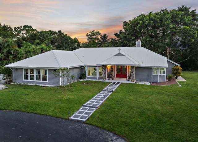 Property at 2505 SE Ranch Acres Cir, Jupiter, FL 33478, 5 beds, 4.5 baths