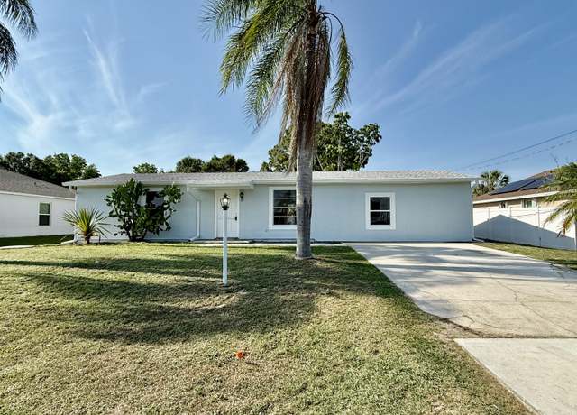 Property at 711 NW Riverside Dr, Port Saint Lucie, FL 34983, 3 beds, 2 baths