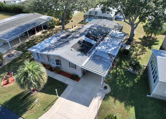 Property at 927 Fir St, Barefoot Bay, FL 32976, 3 beds, 2 baths
