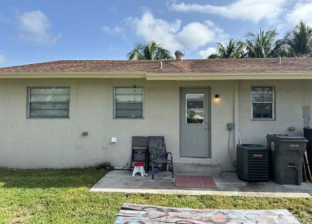 Property at 1704 Citation Dr, West Palm Beach, FL 33417, 4 beds, 2 baths
