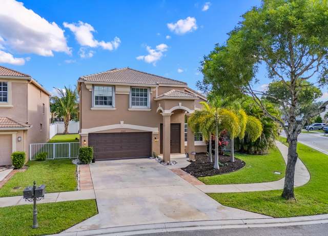 Property at 1245 Oakwater Dr, Royal Palm Beach, FL 33411, 4 beds, 3 baths