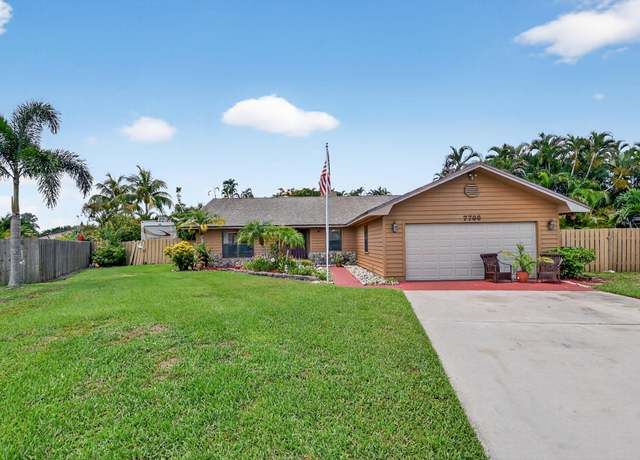 Property at 7700 Woodland Creek Ln, Lake Worth, FL 33467, 3 beds, 2 baths