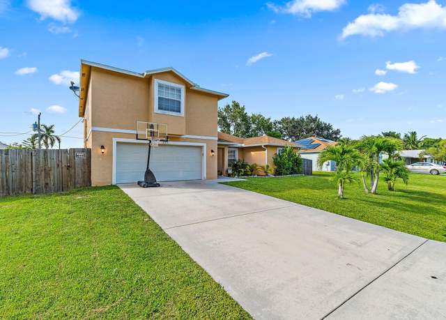 Property at 217 SW Voltair Ter, Port Saint Lucie, FL 34953, 4 beds, 3 baths
