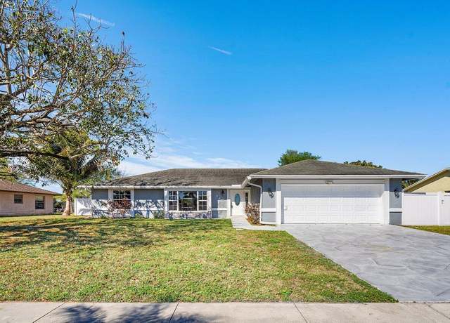 Property at 126 La Mancha Ave, Royal Palm Beach, FL 33411, 3 beds, 2 baths