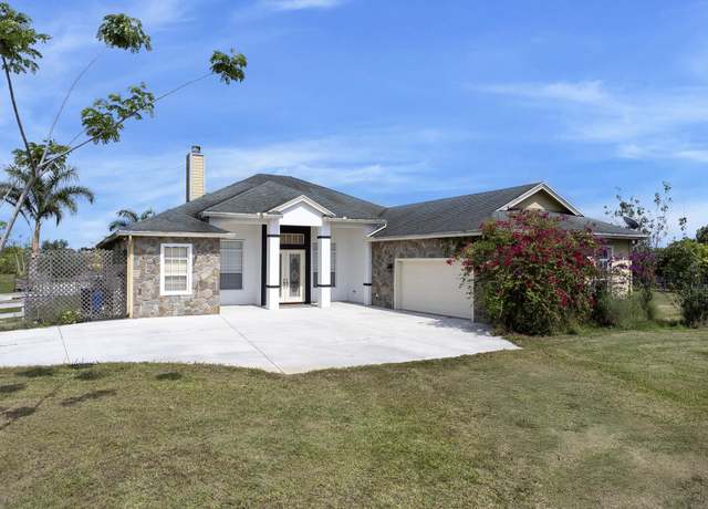 Property at 7900 Germany Canal Rd, Port Saint Lucie, FL 34987, 3 beds, 2 baths