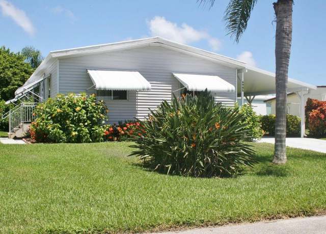 Property at 6985 SE Amendment St, Hobe Sound, FL 33455, 3 beds, 2 baths