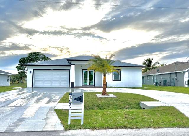 Property at 1822 SW Monterry Ln, Port Saint Lucie, FL 34953, 4 beds, 3 baths