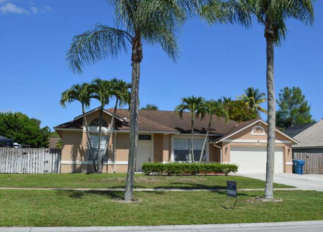 Property at 141 Kings Way, Royal Palm Beach, FL 33411, 4 beds, 2 baths