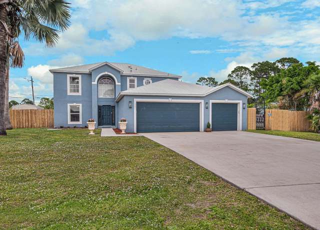 Property at 1597 SW Herder Rd, Port Saint Lucie, FL 34953, 4 beds, 2.5 baths