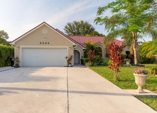 Property at 2365 SE Luau Ave, Port Saint Lucie, FL 34952, 4 beds, 3 baths