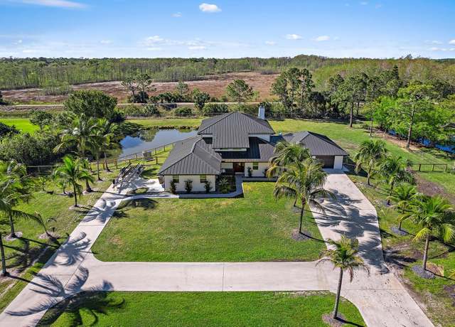 Property at 8718 150th Ct N, Palm Beach Gardens, FL 33418, 5 beds, 3 baths