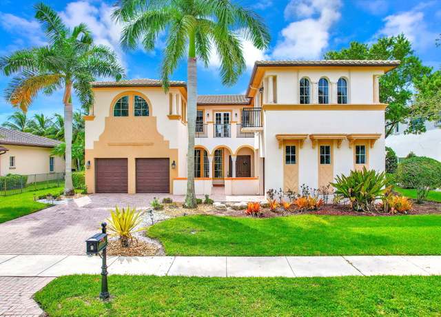 Property at 11144 NW 77 Place Pl, Parkland, FL 33076, 5 beds, 4.5 baths