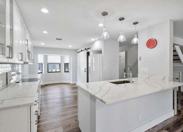 Property at 624 N Deer Creek North Shore Dr N, Deerfield Beach, FL 33442, 3 beds, 2.5 baths