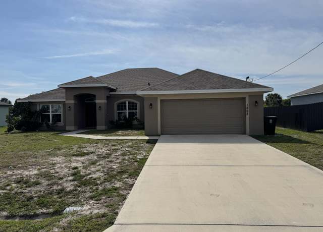 Property at 1898 SW Monterrey Ln, Port Saint Lucie, FL 34953, 4 beds, 3 baths