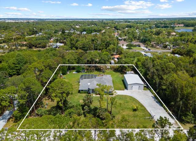 Property at 12177 82nd St N, West Palm Beach, FL 33412, 5 beds, 3 baths