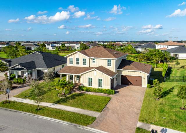 Property at 916 Hookline Cir, Loxahatchee, FL 33470, 5 beds, 4.5 baths