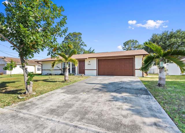 Property at 312 SW Carter Ave, Port Saint Lucie, FL 34983, 4 beds, 3 baths