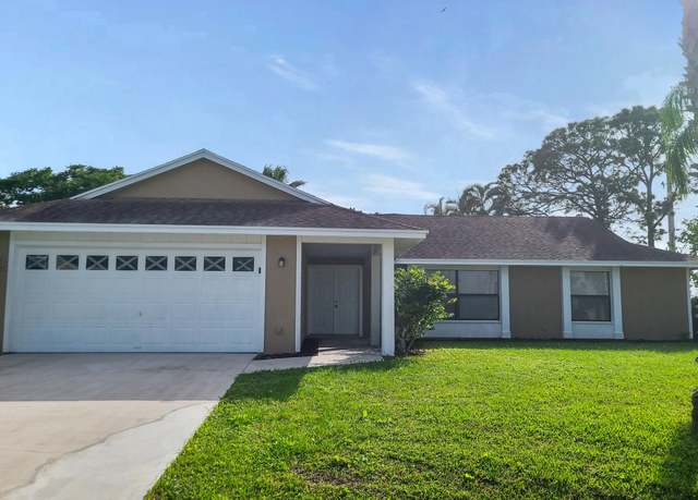 Property at 702 SE Starflower Ave, Port Saint Lucie, FL 34983, 3 beds, 2 baths