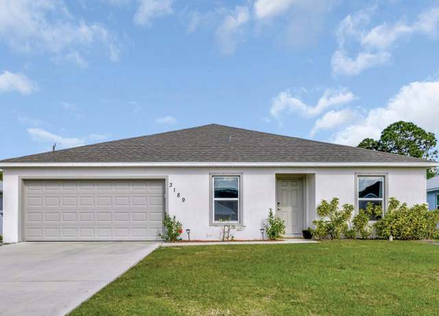 Property at 3189 SW Curcuma St, Port Saint Lucie, FL 34953, 4 beds, 2 baths